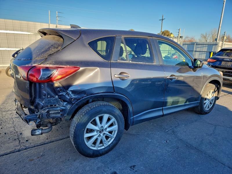 Photo 3 from auction – 2014 MAZDA CX-5 TOURI with VIN JM3KE4CY0E0361455