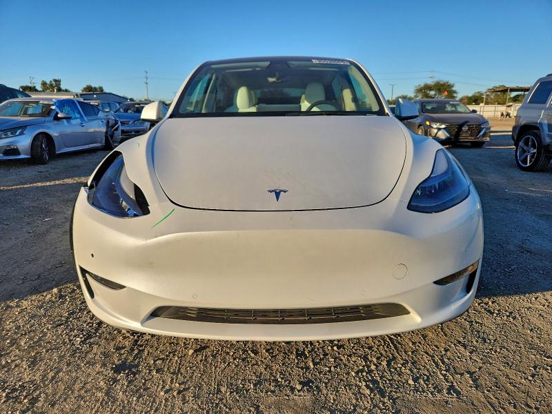 Photo 5 from auction – 2022 TESLA MODEL Y with VIN 7SAYGDEF5NF491082