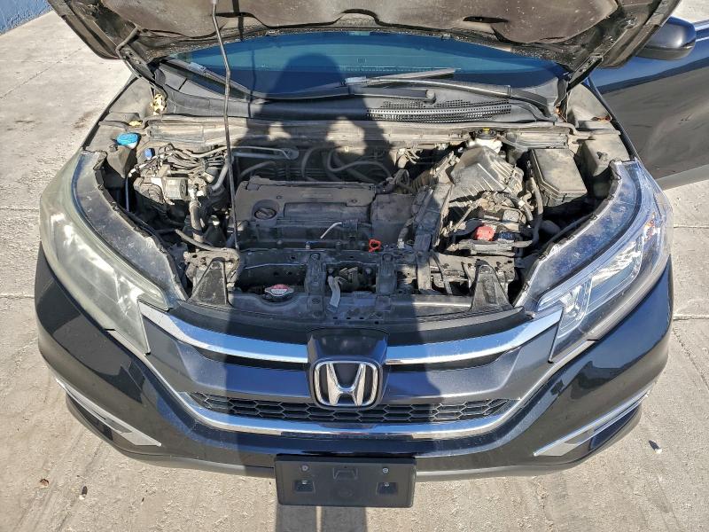 Photo 12 from auction – 2016 HONDA CR-V EXL with VIN 2HKRM4H71GH633124