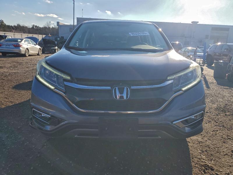 Photo 5 from auction – 2015 HONDA CR-V EX with VIN 2HKRM3H55FH545555