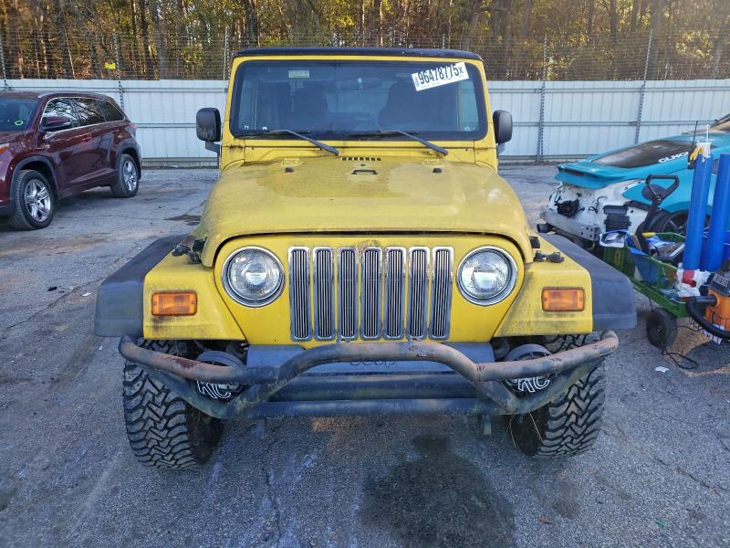 Photo 5 from auction – 2004 JEEP 4X4LIMITED with VIN 1J4FA49S64P790172