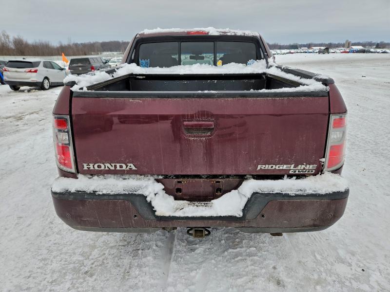 Photo 6 from auction – 2012 HONDA RIDGELINE with VIN 5FPYK1F50CB458723