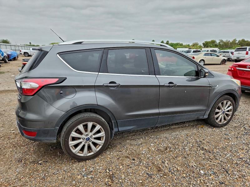 Photo 3 from auction – 2017 FORD ESCAPE TIT with VIN 1FMCU0JD1HUC76674