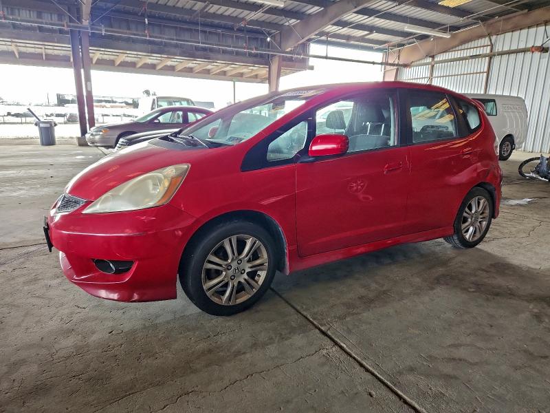 HONDA FIT 2011 with VIN JHMGE8G55BC001063 - Photo from auction