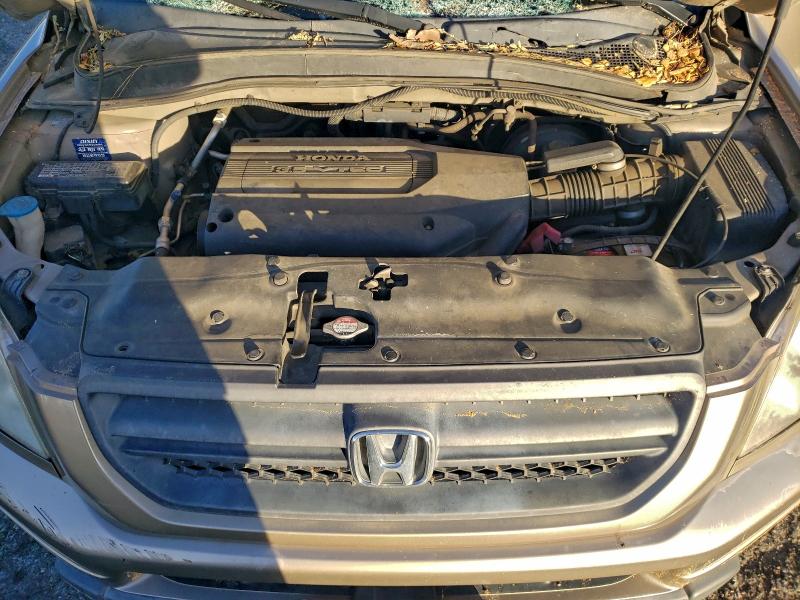 Photo 12 from auction – 2004 HONDA PILOT with VIN 2HKYF18594H612410