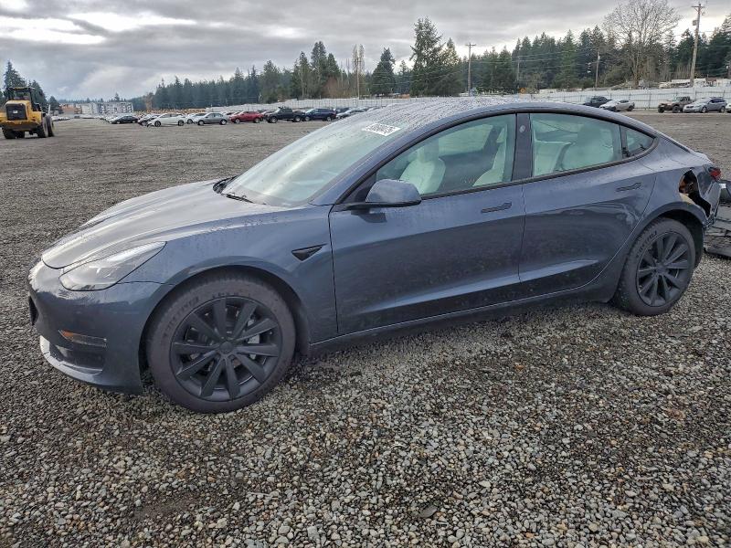 TESLA MODEL 3 2022 with VIN 5YJ3E1EB5NF310684 - Photo from auction