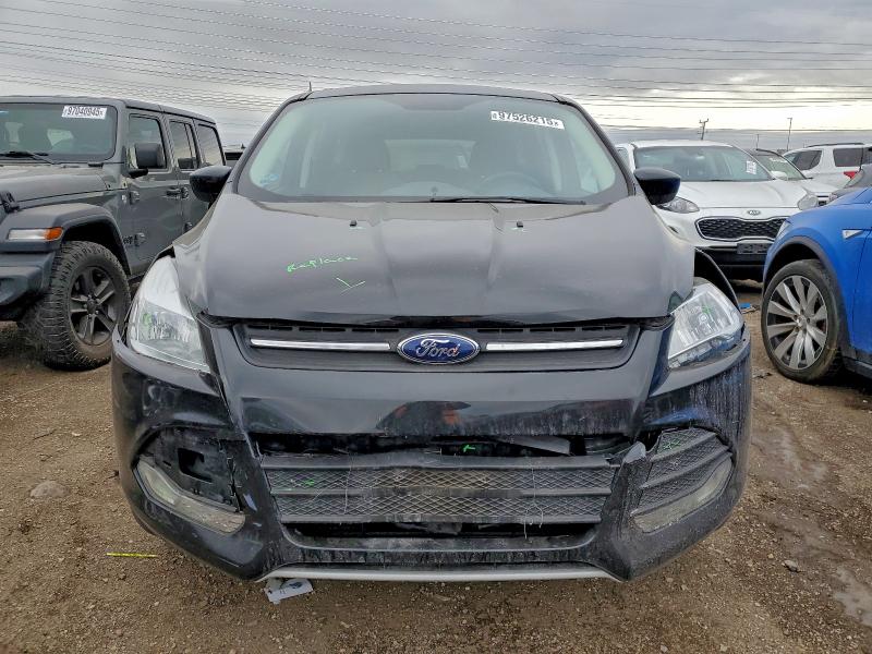 Photo 5 from auction – 2014 FORD ESCAPE with VIN 1FMCU9GX8EUC98771