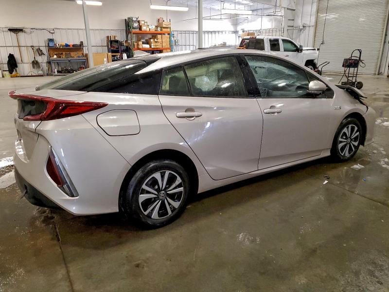 Photo 3 from auction – 2018 TOYOTA PRIUS PRIM with VIN JTDKARFP5J3070043