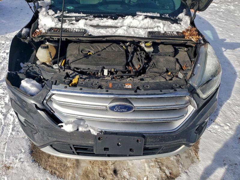 Photo 12 from auction – 2017 FORD ESCAPE SE with VIN 1FMCU0GD4HUC21630