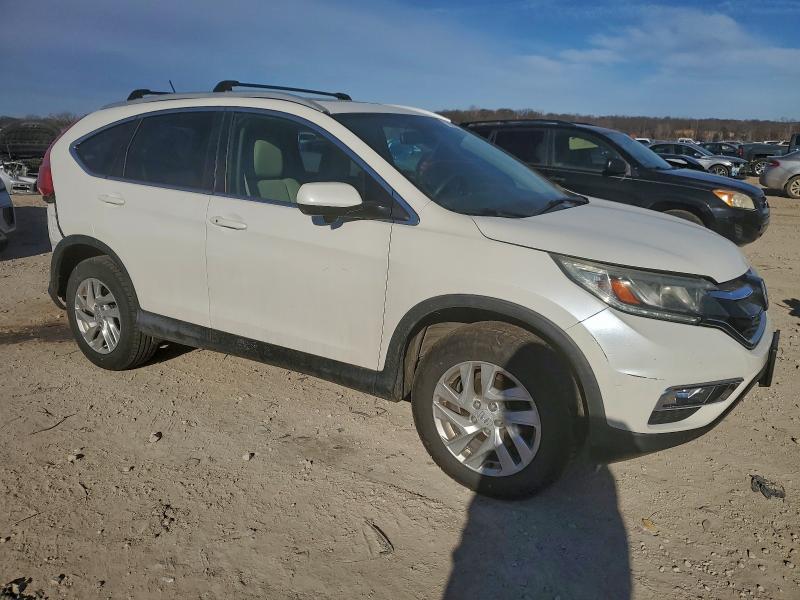 Photo 4 from auction – 2015 HONDA CR-V EX with VIN 5J6RM4H57FL060068