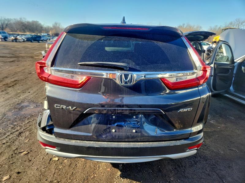 Photo 6 from auction – 2017 HONDA CR-V EX with VIN 5J6RW2H55HL054013