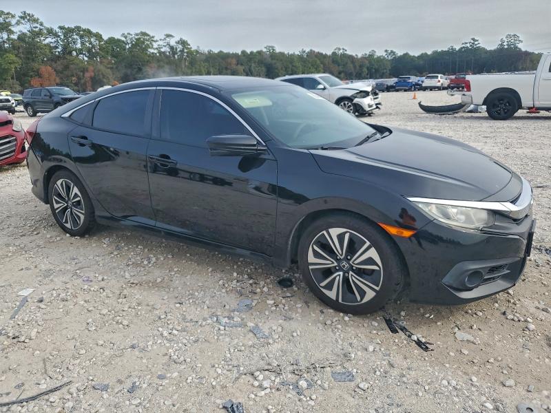 Photo 4 from auction – 2017 HONDA CIVIC EX with VIN 2HGFC1F31HH645032