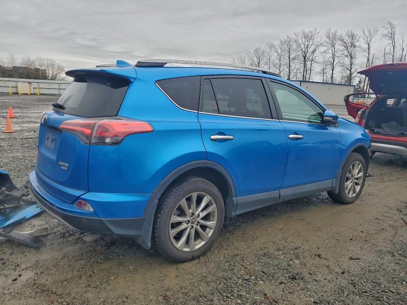 Photo 3 from auction – 2018 TOYOTA RAV4 LIMIT with VIN 2T3DFREV9JW768288