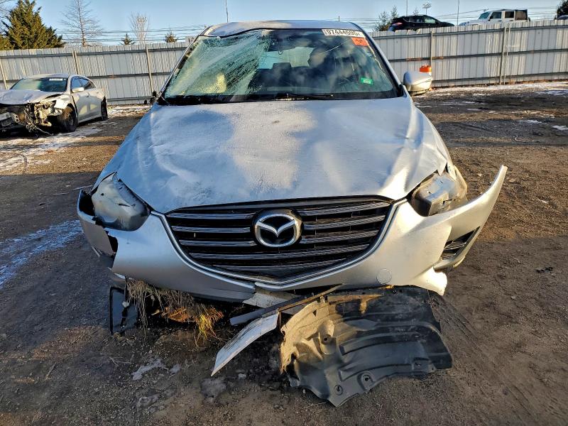 Photo 5 from auction – 2016 MAZDA CX-5 SPORT with VIN JM3KE2BY8G0788097