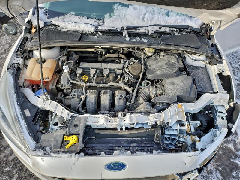 Photo 11 from auction – 2016 FORD FOCUS SEDAN with VIN 1FADP3J22GL247968