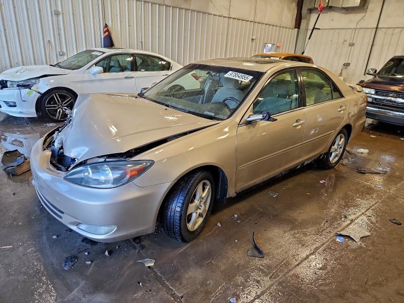 TOYOTA CAMRY LE 2002 with VIN 4T1BF32K12U512557 - Photo from auction