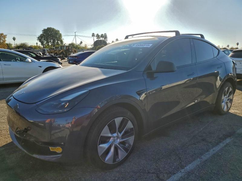 TESLA MODEL Y 2022 with VIN 7SAYGDEEXNF515514 - Photo from auction