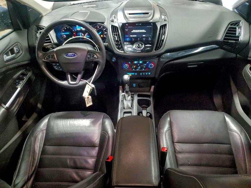 Photo 8 from auction – 2018 FORD ESCAPE TIT with VIN 1FMCU9J95JUC35552