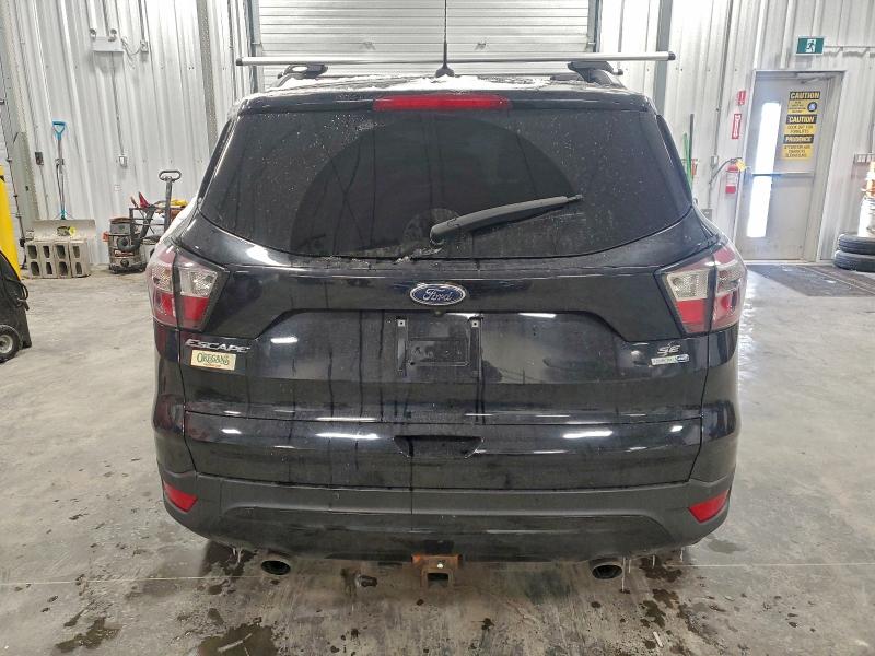 Photo 6 from auction – 2017 FORD ESCAPE SE with VIN 1FMCU9G92HUC82801