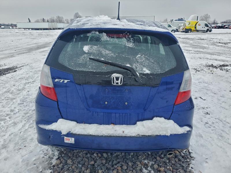 Photo 6 from auction – 2011 HONDA FIT SPORT with VIN JHMGE8H55BC024051