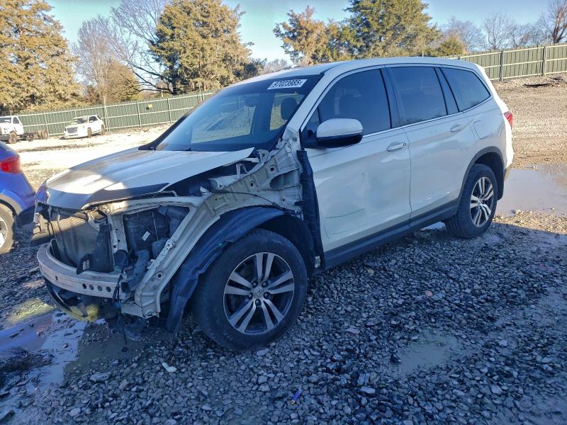 HONDA PILOT EXL 2016 with VIN 5FNYF6H52GB025370 - Photo from auction