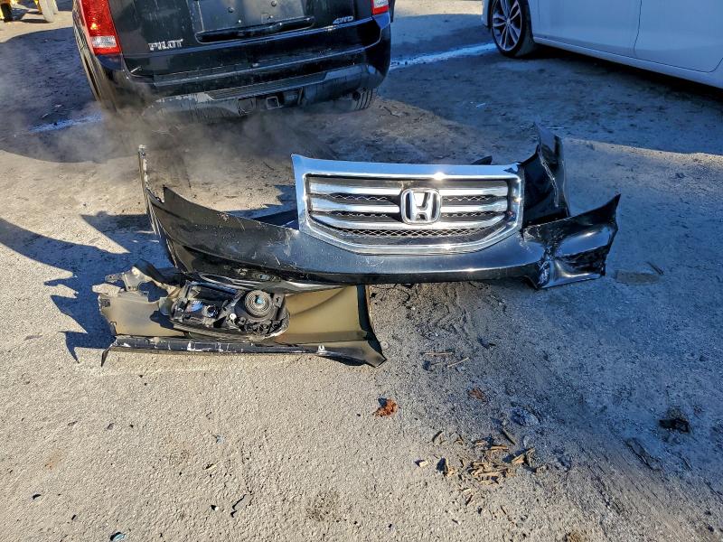 Photo 13 from auction – 2015 HONDA PILOT LX with VIN 5FNYF4H2XFB032494