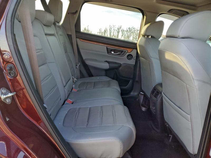 Photo 11 from auction – 2017 HONDA CR-V with VIN 7FARW1H80HE012625