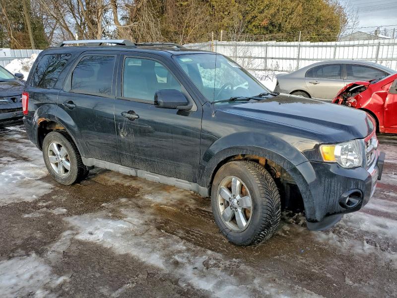 Photo 4 from auction – 2009 FORD ESCAPE LIM with VIN 1FMCU94G59KC95915