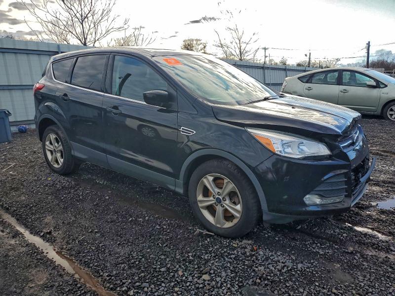 Photo 4 from auction – 2016 FORD ESCAPE SE with VIN 1FMCU9GX2GUB31583