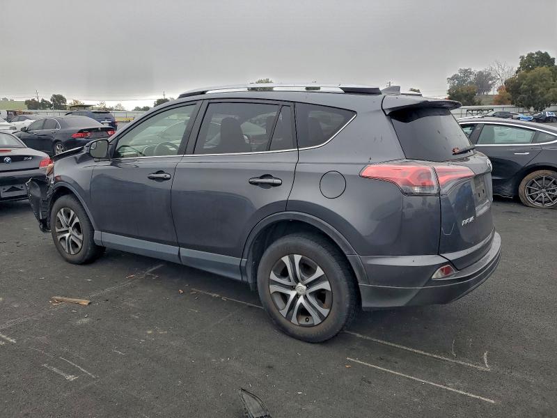 Photo 2 from auction – 2016 TOYOTA RAV4 LE with VIN JTMZFREV4GD081151