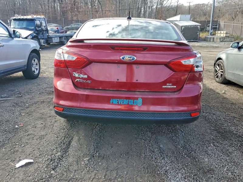 Photo 6 from auction – 2013 FORD FOCUS SE with VIN 1FADP3F27DL234959