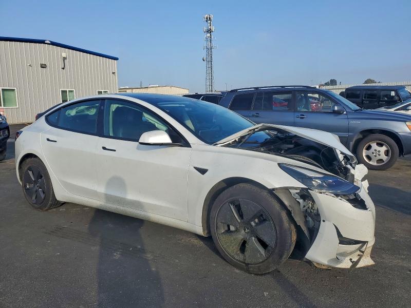 Photo 4 from auction – 2021 TESLA MODEL 3 with VIN 5YJ3E1EA9MF940343