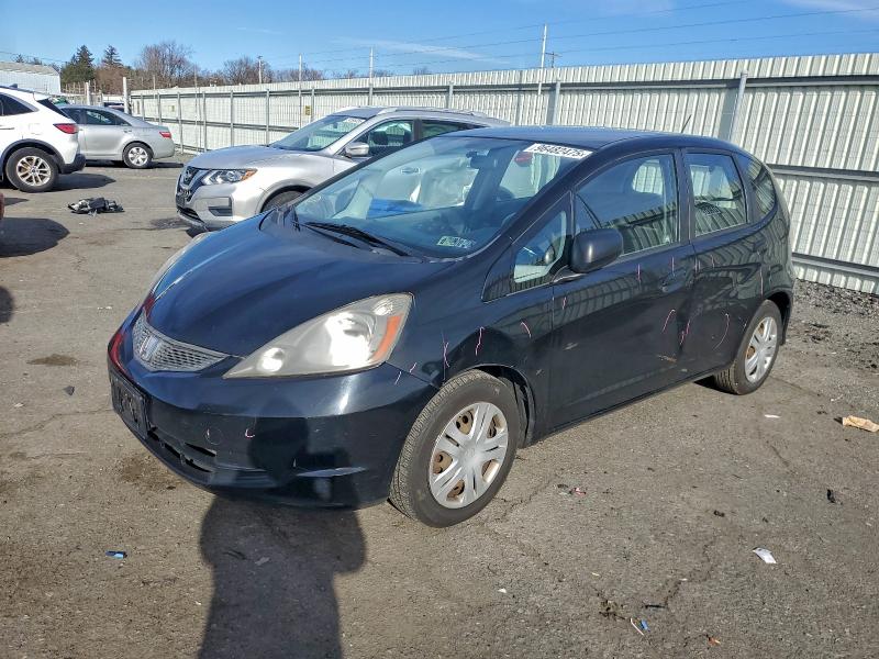 HONDA FIT 2009 with VIN JHMGE88259C002941 - Photo from auction