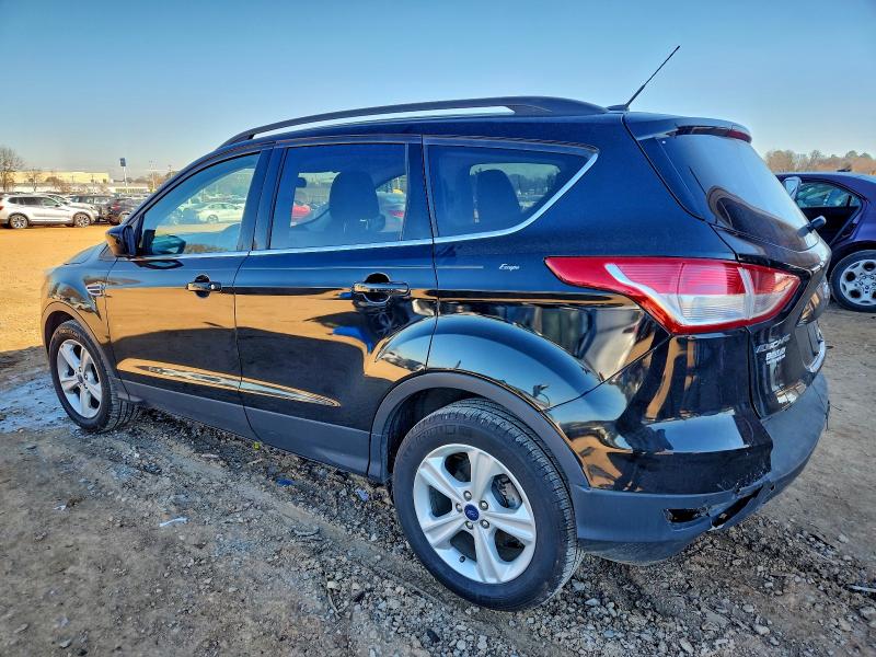Photo 2 from auction – 2016 FORD ESCAPE with VIN 1FMCU0GX5GUB67179