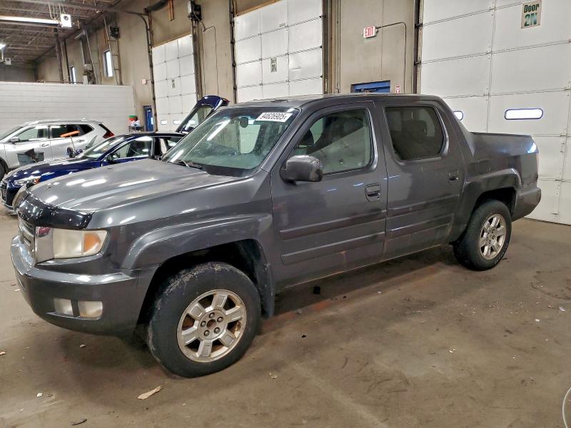 HONDA RIDGELINE 2011 with VIN 5FPYK1F55BB005955 - Photo from auction