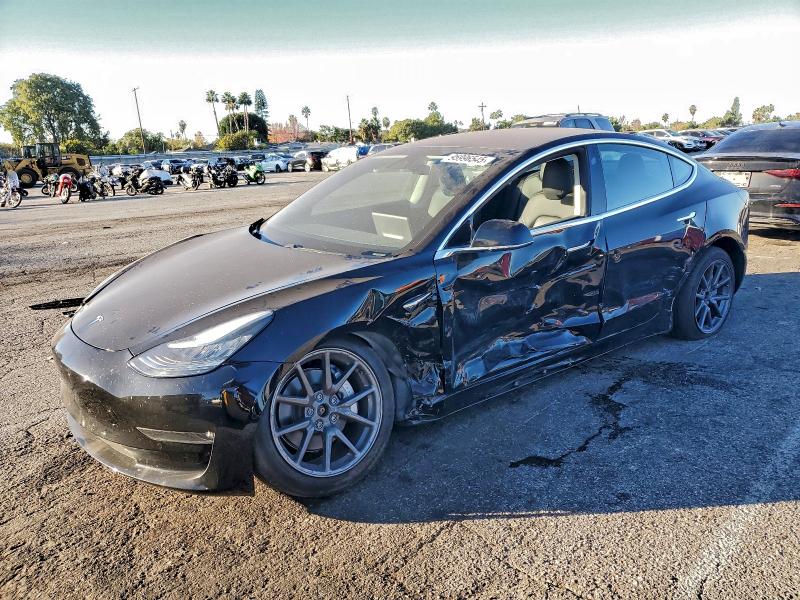 TESLA MODEL 3 2018 with VIN 5YJ3E1EB3JF183668 - Photo from auction