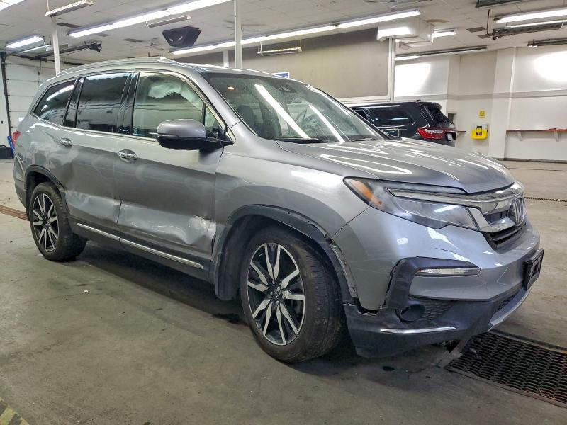 Photo 4 from auction – 2021 HONDA PILOT ELIT with VIN 5FNYF6H0XMB009675