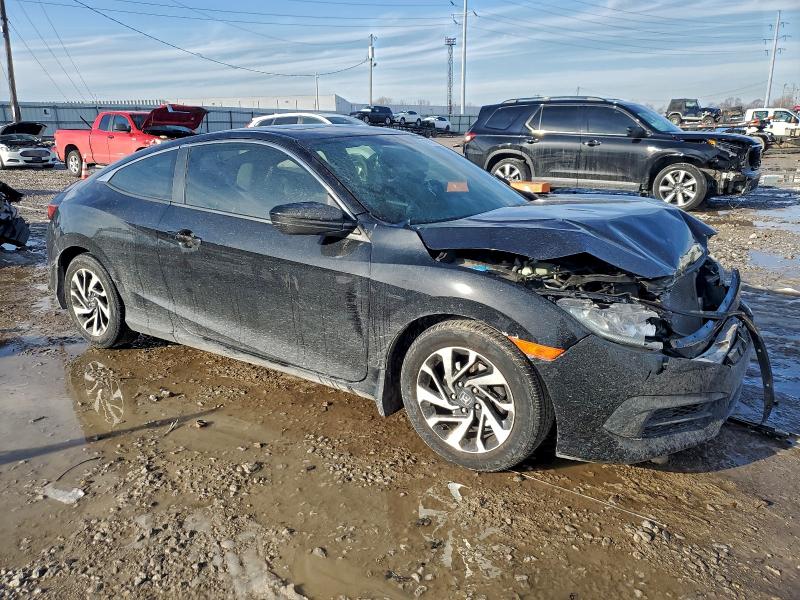 Photo 4 from auction – 2017 HONDA CIVIC LX with VIN 2HGFC4B00HH308185