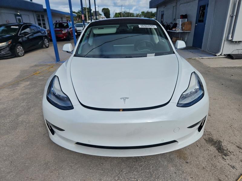 Photo 5 from auction – 2018 TESLA MODEL 3 with VIN 5YJ3E1EA2JF035261
