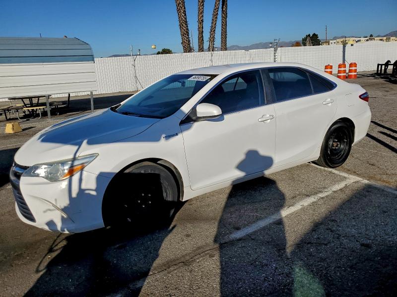 TOYOTA CAMRY HYBR 2015 with VIN 4T1BD1FK2FU155688 - Photo from auction