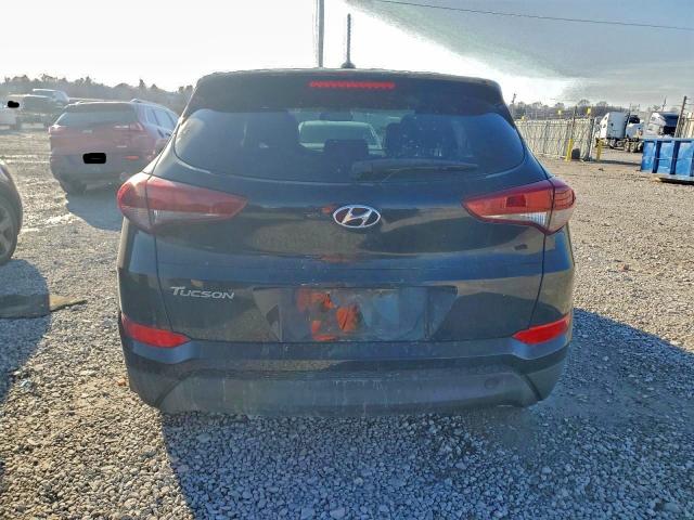 Photo 6 from auction – 2016 HYUNDAI TUCSON SE with VIN KM8J23A47GU237147