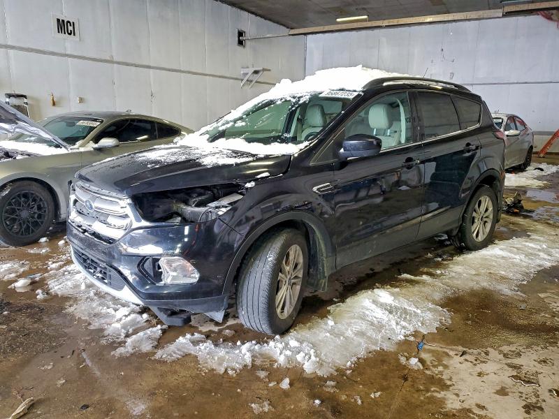 FORD ESCAPE 2018 with VIN 1FMCU9HD3JUC39089 - Photo from auction