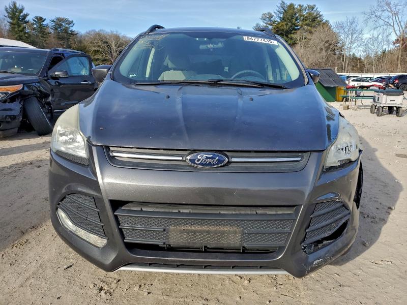 Photo 5 from auction – 2015 FORD ESCAPE SE with VIN 1FMCU9GX8FUC14160