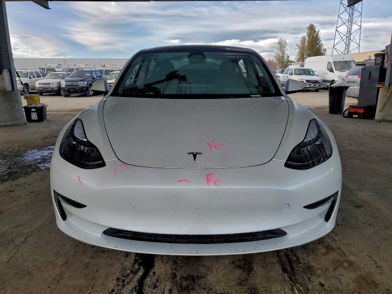 Photo 5 from auction – 2023 TESLA MODEL 3 with VIN 5YJ3E1EA8PF552699