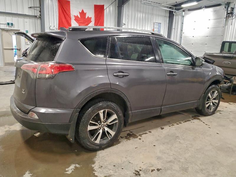 Photo 3 from auction – 2018 TOYOTA RAV4 LE with VIN 2T3BFREV2JW754367