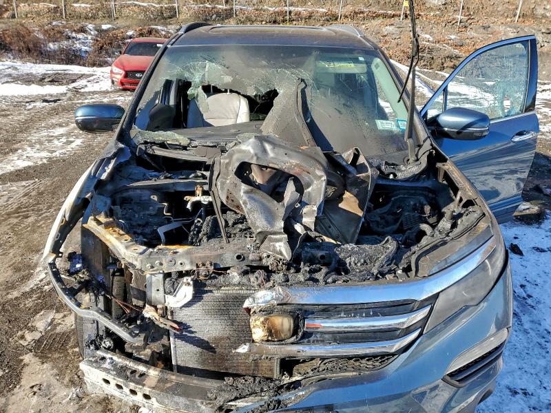 Photo 12 from auction – 2017 HONDA PILOT ELIT with VIN 5FNYF6H09HB020639