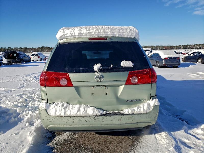 Photo 6 from auction – 2010 TOYOTA SIENNA CE with VIN 5TDKK4CC1AS301326