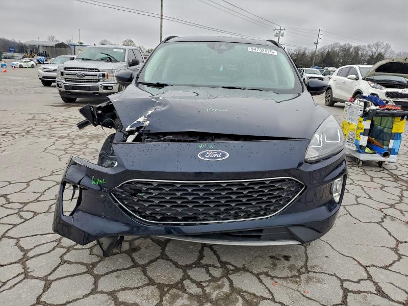 Photo 5 from auction – 2021 FORD ESCAPE SEL with VIN 1FMCU0H62MUB01299