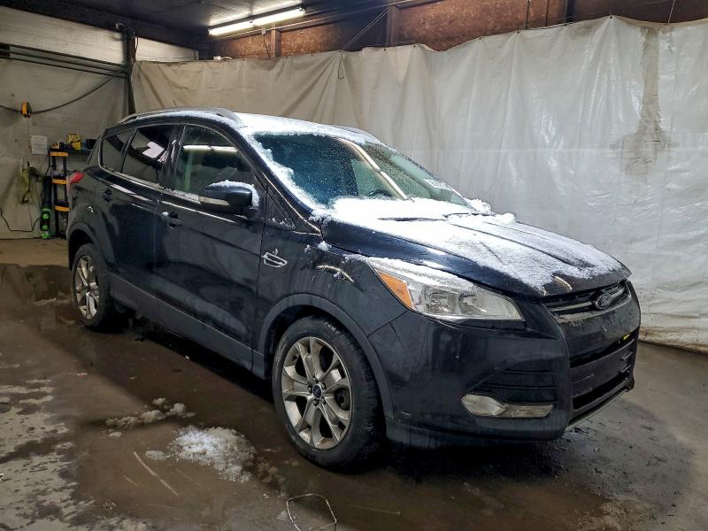Photo 4 from auction – 2015 FORD ESCAPE TIT with VIN 1FMCU9J97FUB58724