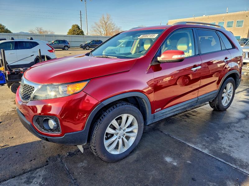 KIA SORENTO EX 2011 with VIN 5XYKUDA25BG042827 - Photo from auction